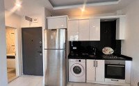 Новая светлая квартира 50 м² район Махмутлар-id-10813-фото-2