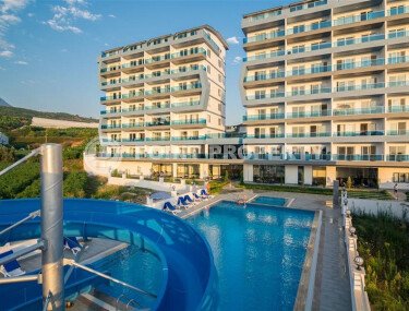 Bright apartment 50 m² with good views, transfer to the sea, Mahmutlar-id-10815-photo-1