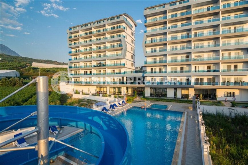 Bright apartment 50 m² with good views, transfer to the sea, Mahmutlar-id-10815-photo-1