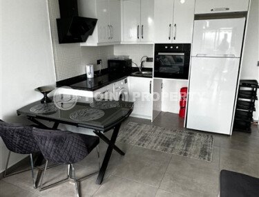 Bright apartment 50 m² with good views, transfer to the sea, Mahmutlar-id-10815-photo-4