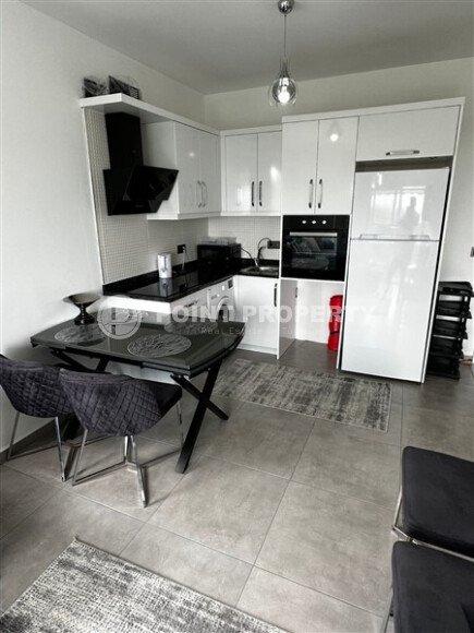 Bright apartment 50 m² with good views, transfer to the sea, Mahmutlar-id-10815-photo-4