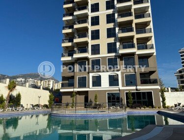 Modern apartment 75 m² with two bedrooms, Mahmutlar district-id-10821-photo-1