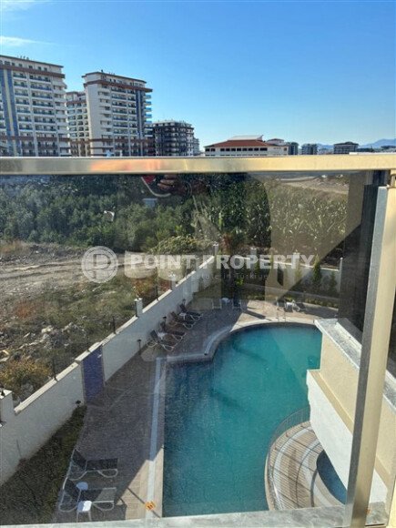 Modern apartment 75 m² with two bedrooms, Mahmutlar district-id-10821-photo-8