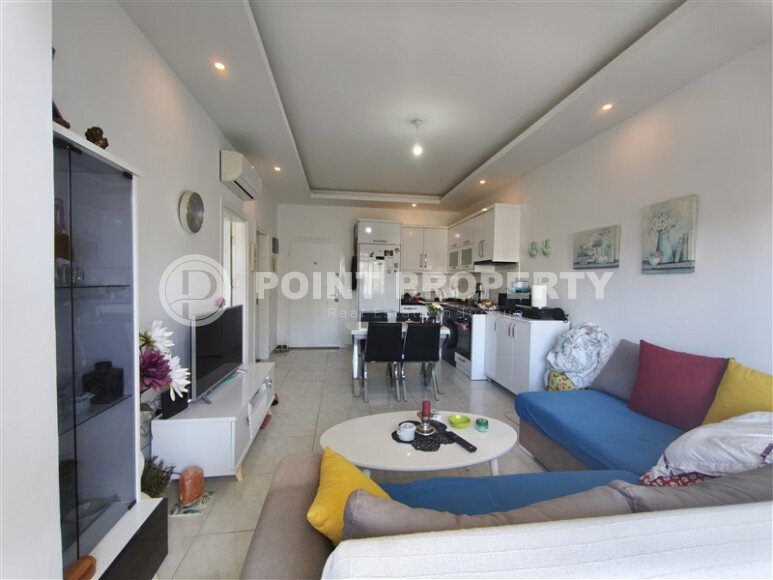 Уютная квартира 55 м² в Махмутларе в жилом комплексе с инфраструктурой-id-10823-фото-2