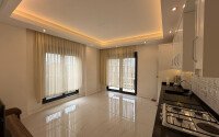 Современная квартира 57 м² в пешей доступности от моря, Махмутлар-id-10349-фото-2