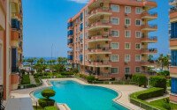 Уютная квартира 120 м² район Махмутлар, рядом с морем, частичный вид на море-id-10848-фото-18