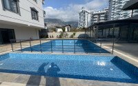 Элегантная квартира 50 м² район Махмутлар в новом комплексе-id-10851-фото-18