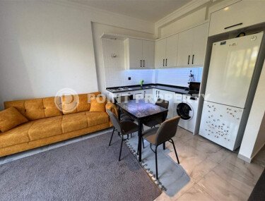 Comfortable 1+1 apartment 42 m² in the Avsallar district with views of the green surroundings-id-10872-photo-3