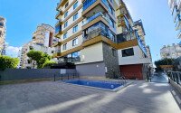 Элегантная квартира 1+1 64 м² район Махмутлар рядом с морем-id-10883-фото-14