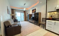 Просторные апартаменты 60 м² в районе Махмутлар с застеклённым балконом и инфраструктурой для отдыха-id-10903-фото-1