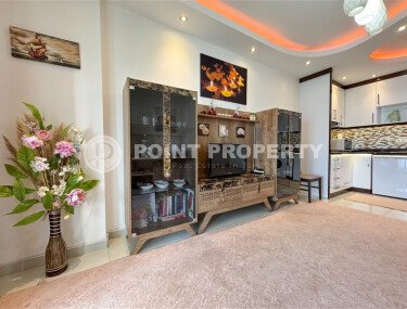 Spacious 60 m² apartment in Mahmutlar with a glazed balcony and leisure facilities-id-10903-photo-2