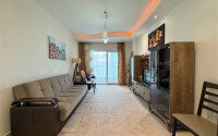 Просторные апартаменты 60 м² в районе Махмутлар с застеклённым балконом и инфраструктурой для отдыха-id-10903-фото-3