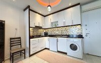 Просторные апартаменты 60 м² в районе Махмутлар с застеклённым балконом и инфраструктурой для отдыха-id-10903-фото-4
