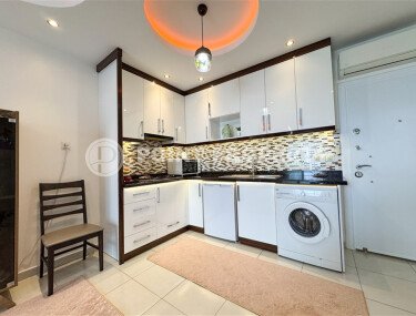 Spacious 60 m² apartment in Mahmutlar with a glazed balcony and leisure facilities-id-10903-photo-4
