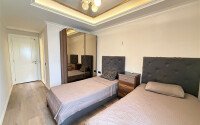 Prestigious 3+1 apartments with citizenship in the center of Alanya with panoramic views of the sea and the fortress-id-10905-photo-9