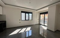 Новые апартаменты 1+1 50 м² в районе Махмутлар в 100 метрах от моря-id-10906-фото-1