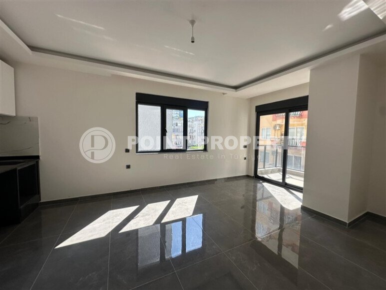 Новые апартаменты 1+1 50 м² в районе Махмутлар в 100 метрах от моря-id-10906-фото-1