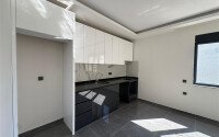 Новые апартаменты 1+1 50 м² в районе Махмутлар в 100 метрах от моря-id-10906-фото-2