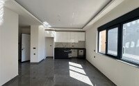 Новые апартаменты 1+1 50 м² в районе Махмутлар в 100 метрах от моря-id-10906-фото-3