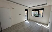Новые апартаменты 1+1 50 м² в районе Махмутлар в 100 метрах от моря-id-10906-фото-4