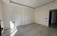 Новые апартаменты 1+1 50 м² в районе Махмутлар в 100 метрах от моря-id-10906-фото-6
