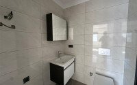 Новые апартаменты 1+1 50 м² в районе Махмутлар в 100 метрах от моря-id-10906-фото-8