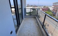 Перспективные апартаменты 55 м² в районе Паяллар с видом на море-id-10909-фото-6