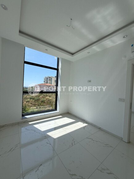 Modern new apartment 45 m² in Mahmutlar area with partial sea view-id-10912-photo-5