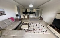 Spacious 65 m² apartment with panoramic windows and views of the green surroundings in Avsallar-id-10916-photo-3