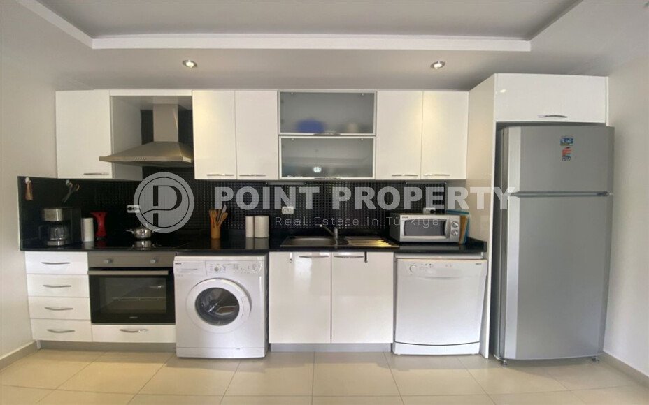 Spacious 65 m² apartment with panoramic windows and views of the green surroundings in Avsallar-id-10916-photo-6