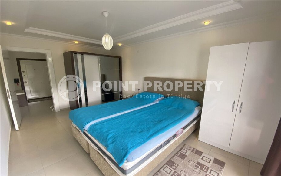 Spacious 65 m² apartment with panoramic windows and views of the green surroundings in Avsallar-id-10916-photo-9