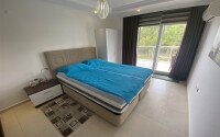 Spacious 65 m² apartment with panoramic windows and views of the green surroundings in Avsallar-id-10916-photo-12