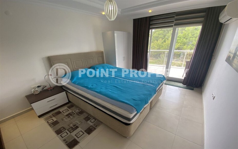 Spacious 65 m² apartment with panoramic windows and views of the green surroundings in Avsallar-id-10916-photo-12