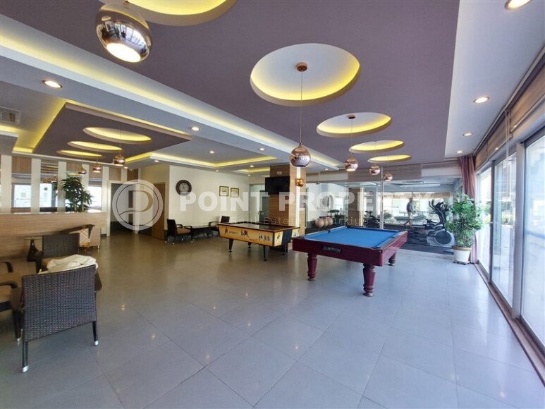 Spacious 65 m² apartment with panoramic windows and views of the green surroundings in Avsallar-id-10916-photo-16