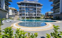 Cozy 1+1 apartment 51 m² in the Oba area with panoramic windows-id-10918-photo-1