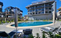 Cozy 1+1 apartment 51 m² in the Oba area with panoramic windows-id-10918-photo-2