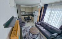 Cozy 1+1 apartment 51 m² in the Oba area with panoramic windows-id-10918-photo-4
