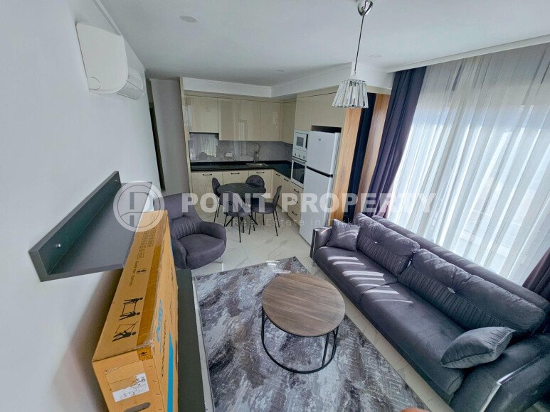 Cozy 1+1 apartment 51 m² in the Oba area with panoramic windows-id-10918-photo-4