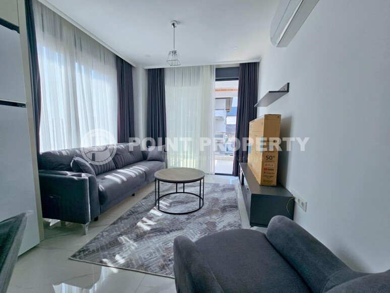 Cozy 1+1 apartment 51 m² in the Oba area with panoramic windows-id-10918-photo-5