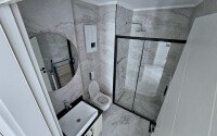 Cozy 1+1 apartment 51 m² in the Oba area with panoramic windows-id-10918-photo-12