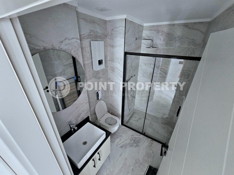 Cozy 1+1 apartment 51 m² in the Oba area with panoramic windows-id-10918-photo-12