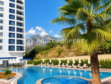 1+1 apartment with an area of 54 m² in a new complex in Mahmutlar-id-10925-photo-1