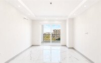 1+1 apartment with an area of 54 m² in a new complex in Mahmutlar-id-10925-photo-2
