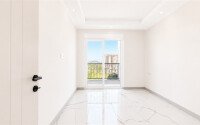 1+1 apartment with an area of 54 m² in a new complex in Mahmutlar-id-10925-photo-4