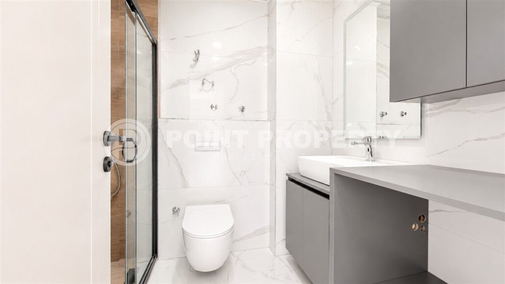 1+1 apartment with an area of 54 m² in a new complex in Mahmutlar-id-10925-photo-5