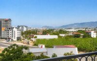 1+1 apartment with an area of 54 m² in a new complex in Mahmutlar-id-10925-photo-6