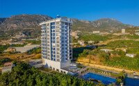 1+1 apartment with an area of 54 m² in a new complex in Mahmutlar-id-10925-photo-16