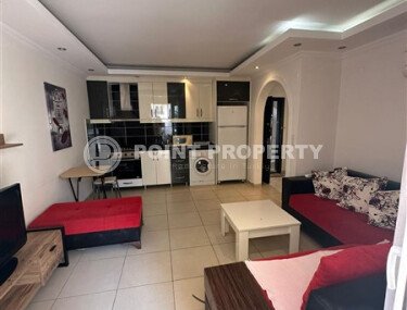 1+1 apartment of 60 m² in Mahmutlar near the sea-id-10926-photo-2