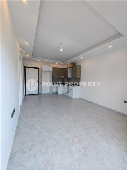 1+1 apartment with an area of 47 m² in a new residential complex in Avsallar-id-10927-photo-1