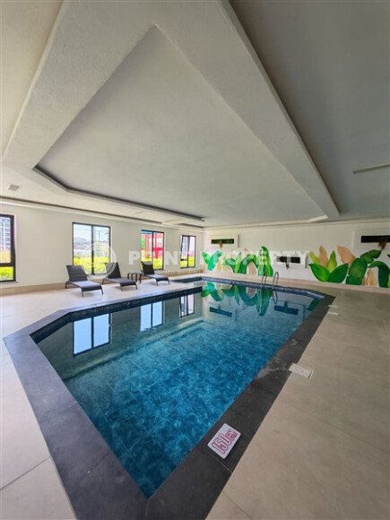 1+1 apartment with an area of 47 m² in a new residential complex in Avsallar-id-10927-photo-11